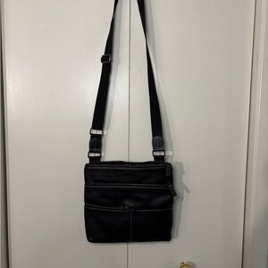 Roots Black Messenger Bag with Adjustable Straps and Minimalist Design